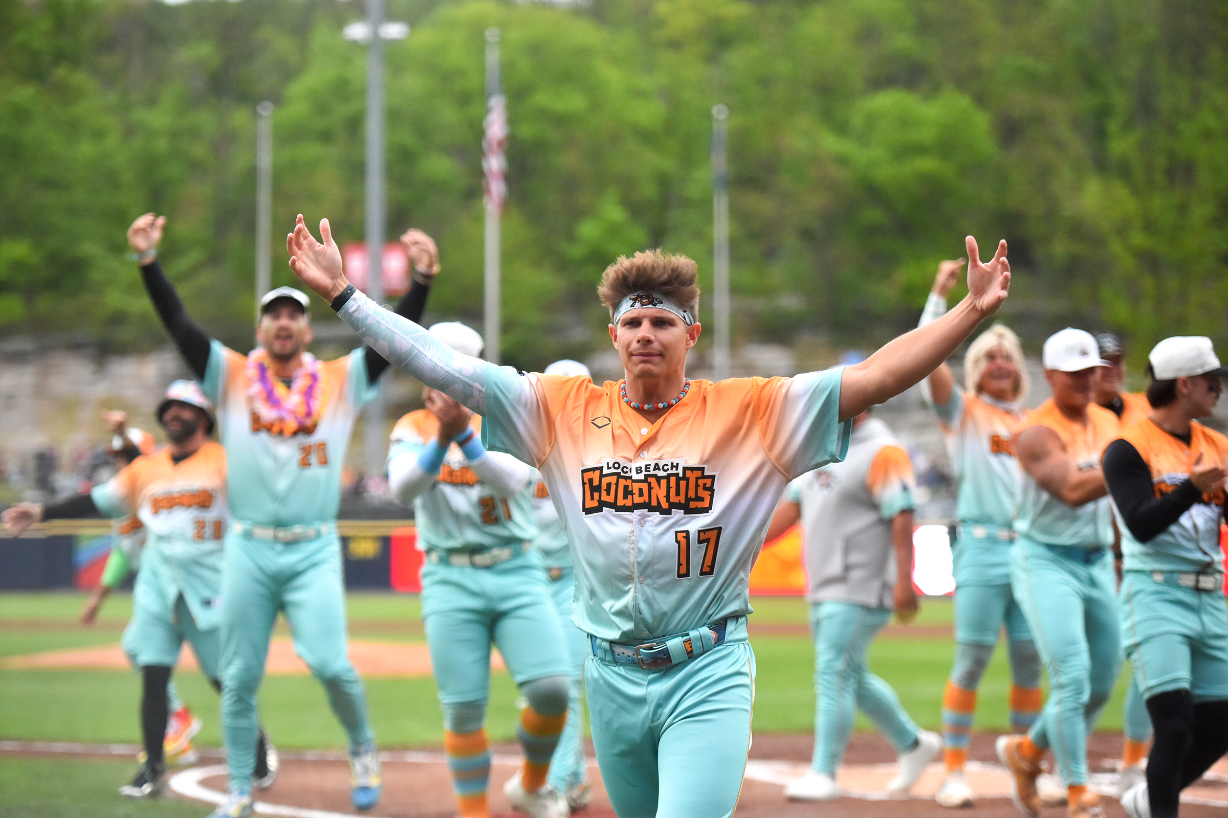 Loco Beach Coconuts player Blake Benson (17) peps up the...