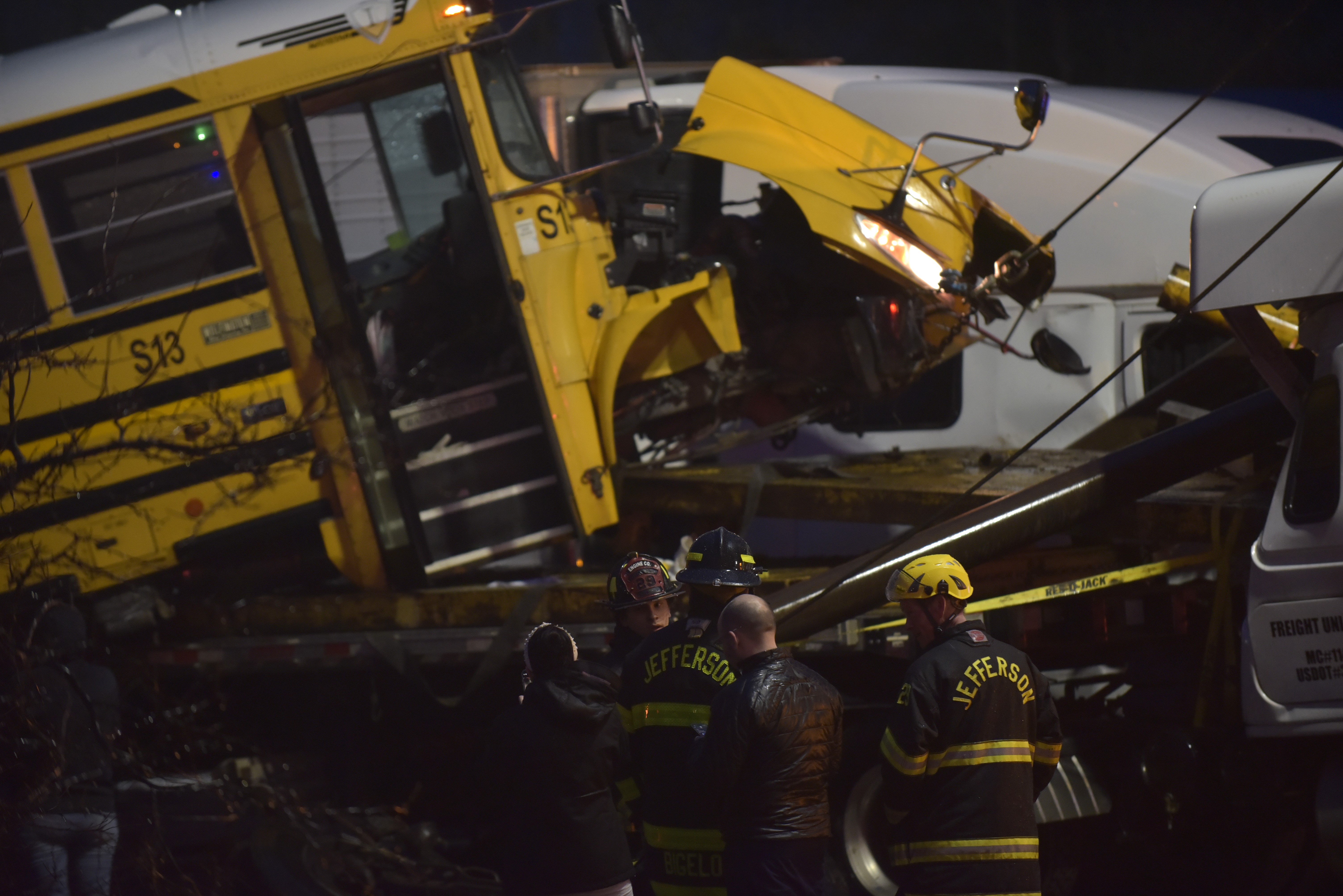 Jefferson Township first reposnders look over the scene of a...
