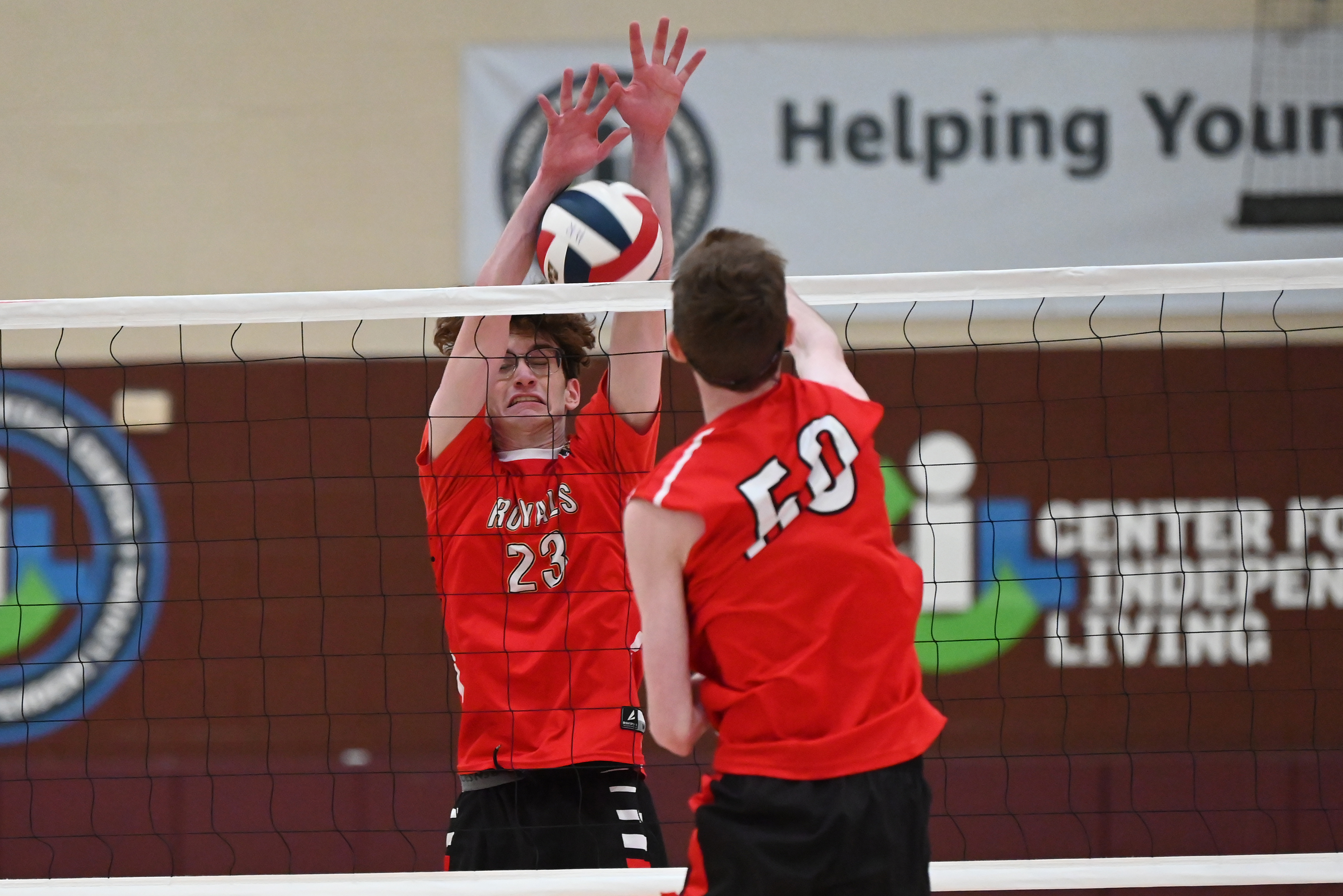 Holy Redeemer’s Jack McCue attempts to block Crestwood’s Eric Rinehimer...