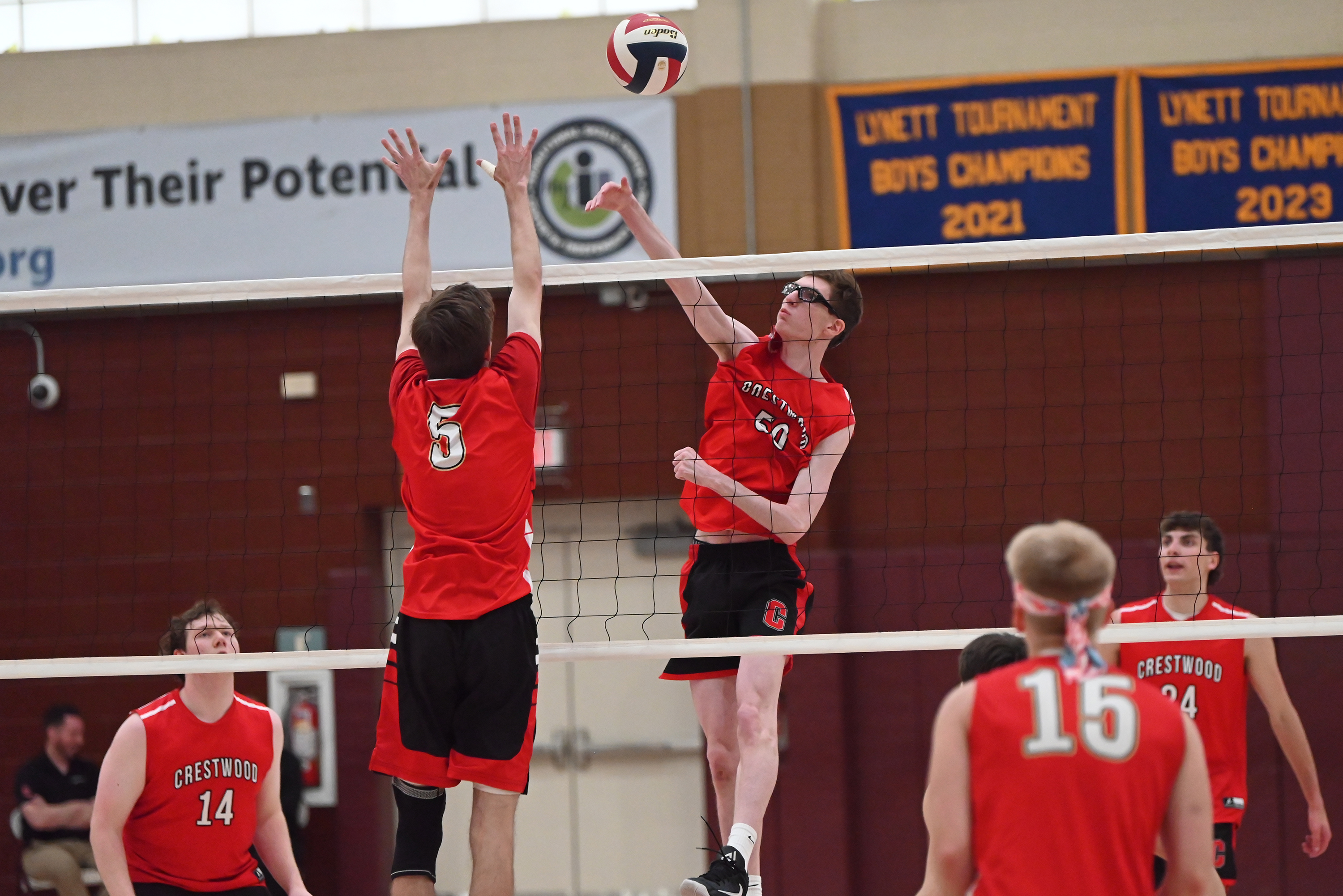 Holy Redeemer’s Brandon Del Balso attempts to block Crestwood’s Eric...
