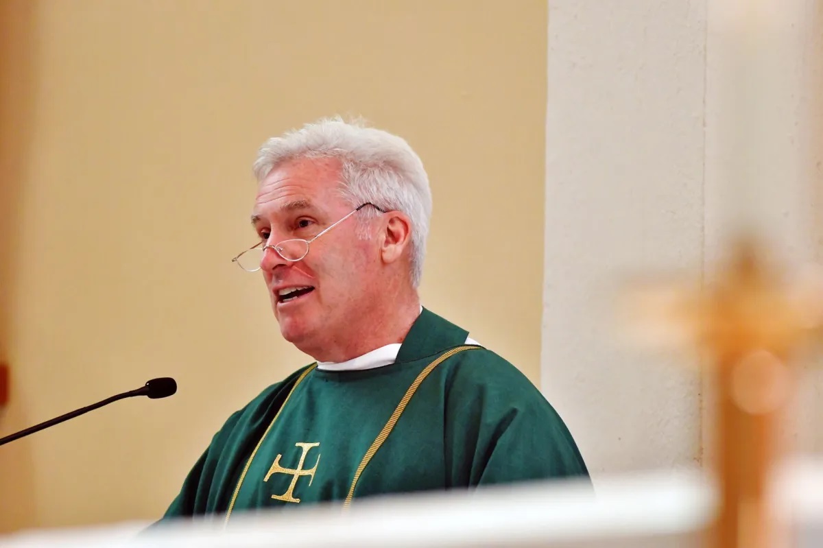 The Rev. David Cappelloni conducts Mass at Our Lady of...