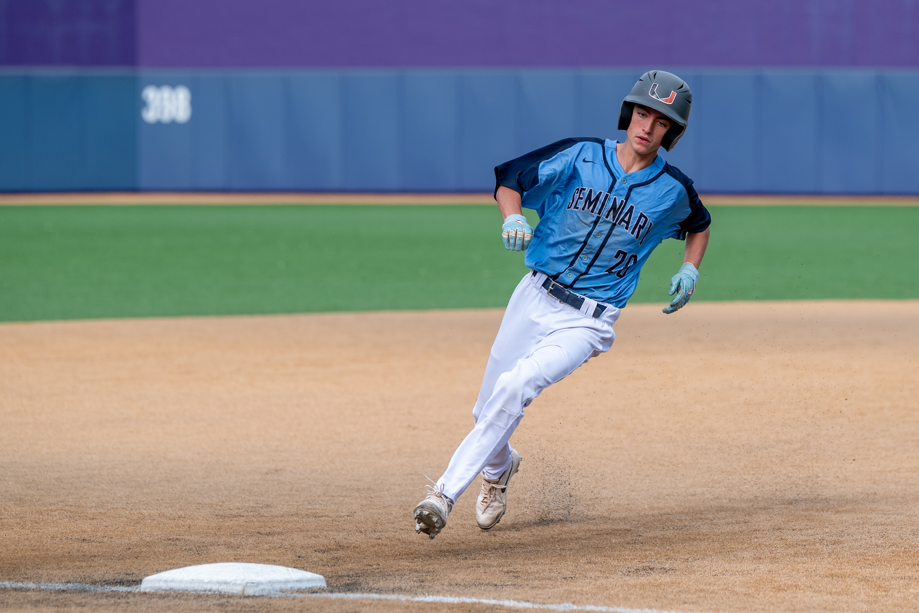 Wyoming Seminary’s George Rolland heads toward third during the District...