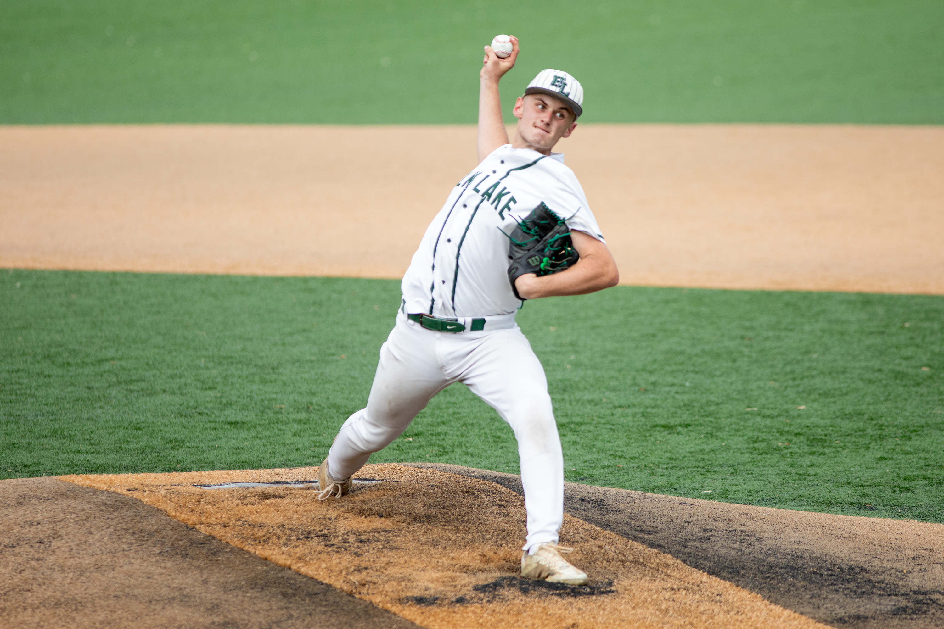 Elk Lake’s Brayden Miller pitches during the District 2 Class...