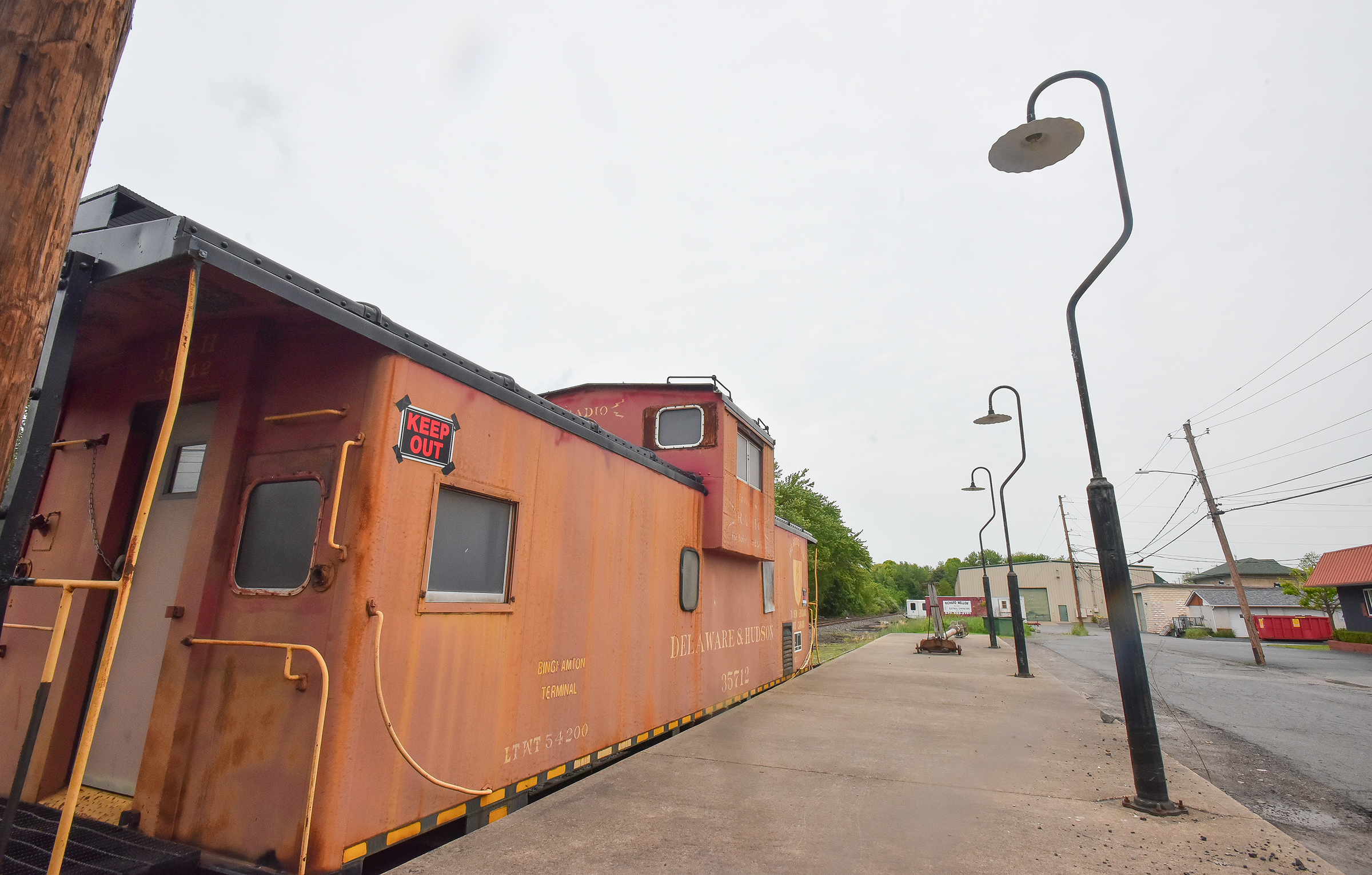 A caboose sits at the platform of the Delaware and...