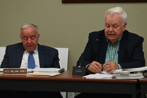 Dickson City Solicitor William Jones asks city planner Thomas Shepstone questions regarding potential data centers in the borough's M1 district during the zoning board hearing at the Dickson City Municipal Building in Dickson City on Tuesday, May 20, 2026. (REBECCA PARTICKA/STAFF PHOTOGRAPHER)