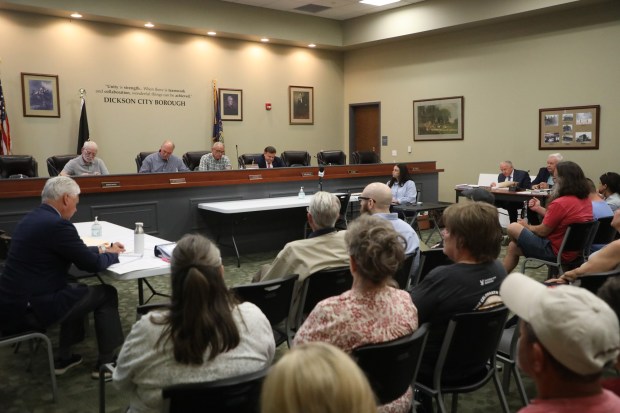 Community members gather at the Dickson City Municipal Building in Dickson City to listen to the zoning board hearing regarding potential data centers in the borough's M1 district on Tuesday, May 20, 2026. (REBECCA PARTICKA/STAFF PHOTOGRAPHER)
