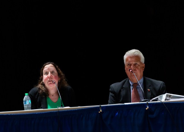 Essential Energy LLC's air quality expert, Nicole Wilson of engineering firm Earthres, and Attorney Michael Mey react to questions during a conditional use hearing in the Valley View High School auditorium in Archbald to consider the 400-megawatt natural gas power plant on Thursday, May 21, 2026. (FRANK WILKES LESNEFSKY / STAFF PHOTO)