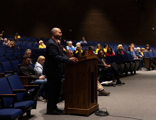Attorney Justin Richards, who represents borough residents fighting data centers, cross examines Essential Energy LLC witnesses during a conditional use hearing in the Valley View High School auditorium in Archbald to consider the 400-megawatt natural gas power plant on Thursday, May 21, 2026. (FRANK WILKES LESNEFSKY / STAFF PHOTO)