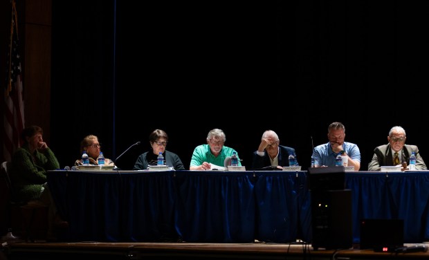 Archbald officials listen to testimony during a conditional use hearing in the Valley View High School auditorium in Archbald as council considers Essential Energy LLC's 400-megawatt natural gas power plant on Thursday, May 21, 2026. (FRANK WILKES LESNEFSKY / STAFF PHOTO)