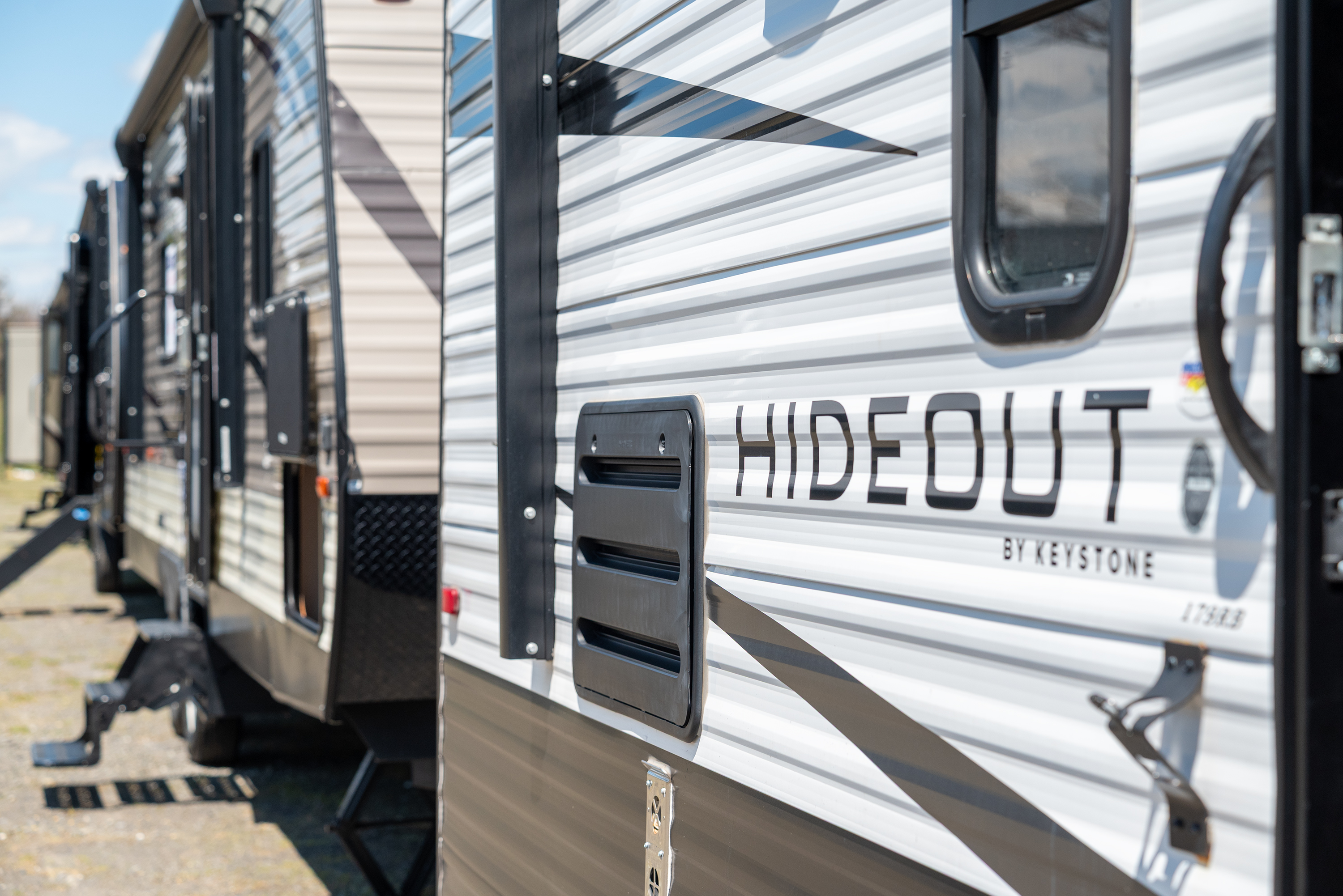 Campers parked in a parking lot at PNC Field in...