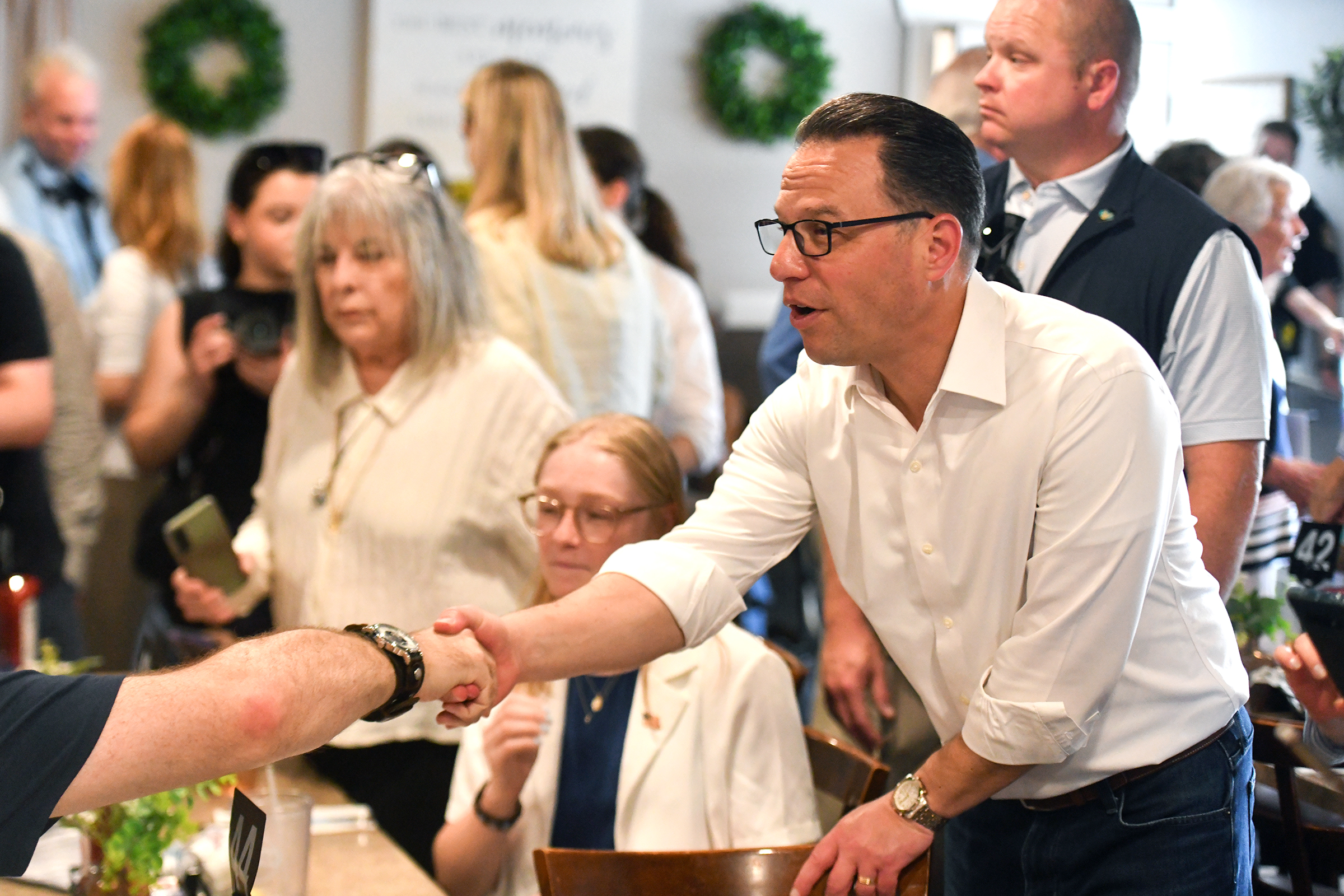 Governor Josh Shapiro greets supporters at The Avenue Restaurant &...