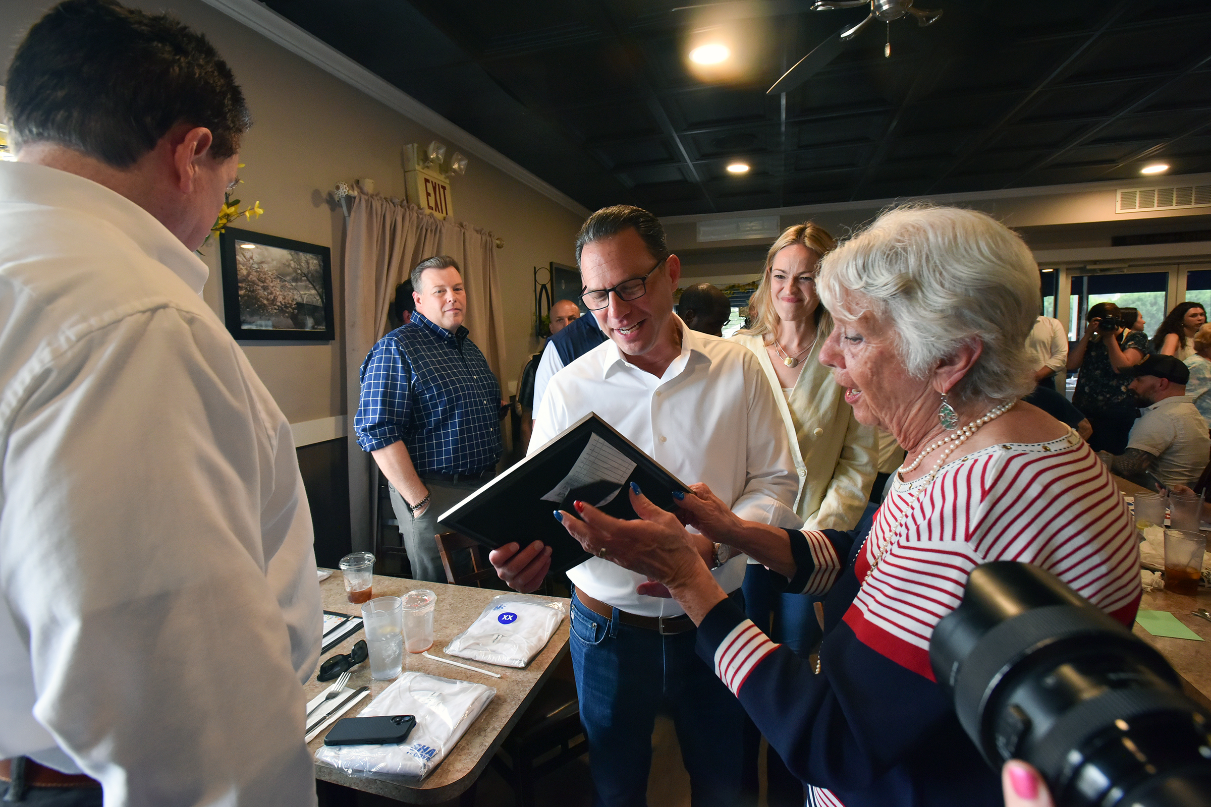 Governor Josh Shapiro talks with Clarks Summit Borough Council President...