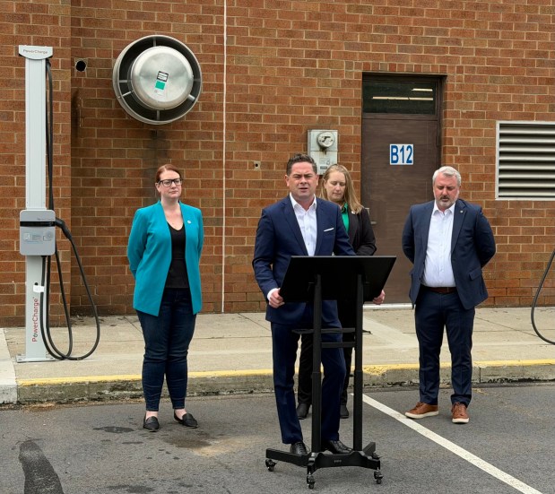State Rep. Kyle Mullins, D-112, Blakely, provides remarks during a news conference with other state legislators and advocates Thursday morning, on the grounds of the Mid Valley School District in Throop, aimed at urging elected officials in the state and country to take action on proposed bills to help lower energy prices and save Pennsylvanians money at the pump. (ROBERT TOMKAVAGE/STAFF PHOTO)