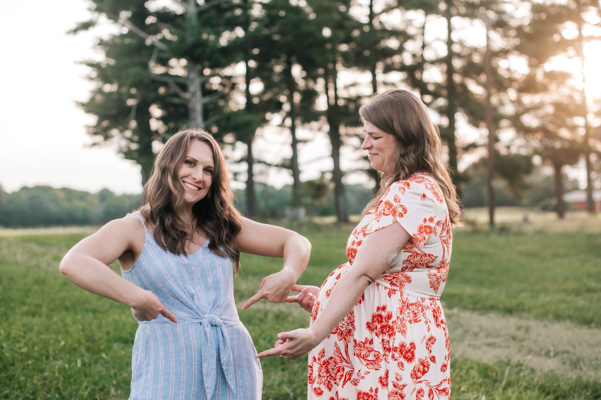 The couple during their pregnancies. LeighAnn is in blue. (COURTESY...