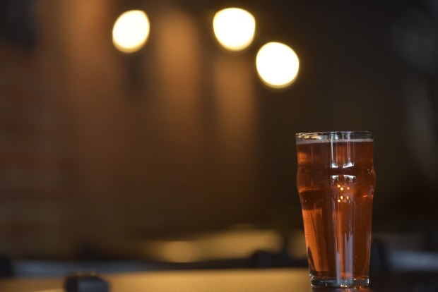 A glass of cider is shown at Electric City Ciderworks on Linden Street in downtown Scranton. (CHAD SEBRING/STAFF PHOTO)