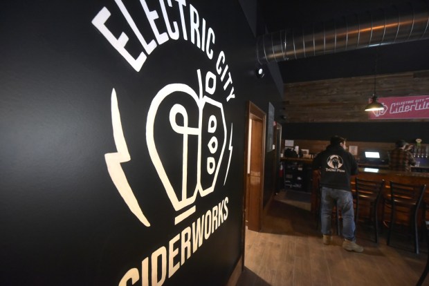 Electric City Ciderworks on Linden Street in Scranton opened in April. Three brothers, Tom, Mike and Alex Borthwick, transformed the downtown property into a new cidery while preserving some of the city's past in the process. (CHAD SEBRING/STAFF PHOTO)