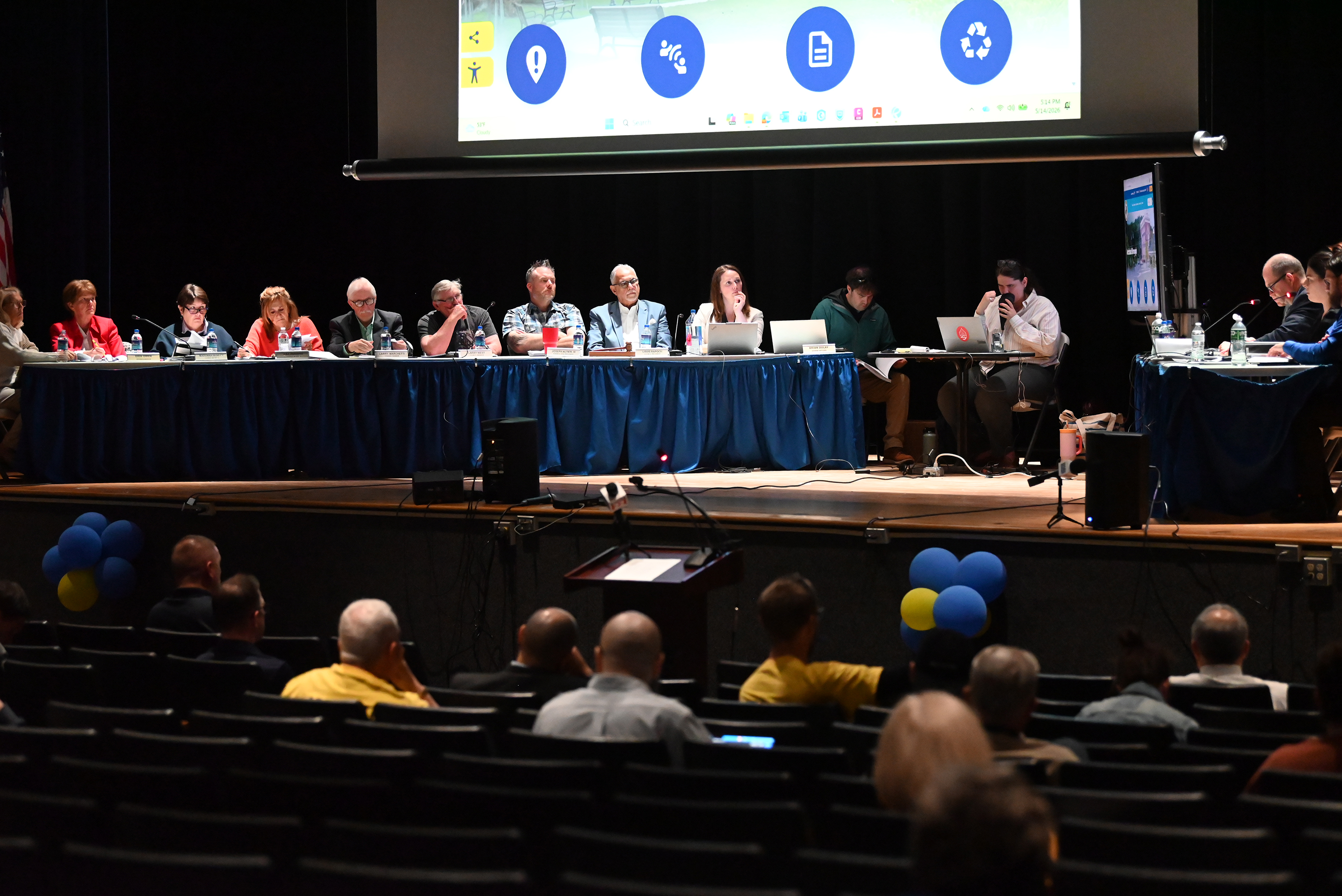 Community members and borough councilmembers listen to Attorney Edmund Campbell...