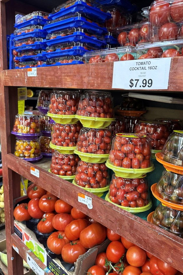 Tomatoes await customers on the shelves of a supermarket in New York on Tuesday. (Matt Sedensky/ASSOCIATED PRESS)