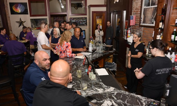 Supporters wait for former Bethlehem firefighter and Democratic congressional candidate Bob Brooks to arrive at his election party on Primary Day, Tuesday, May 19, 2026, at Artisan in Bethlehem. (Monica Cabrera/The Morning Call)