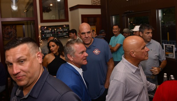 Supporters wait for former Bethlehem firefighter and Democratic congressional candidate Bob Brooks to arrive at his election party on Primary Day, Tuesday, May 19, 2026, at Artisan in Bethlehem. (Monica Cabrera/The Morning Call)