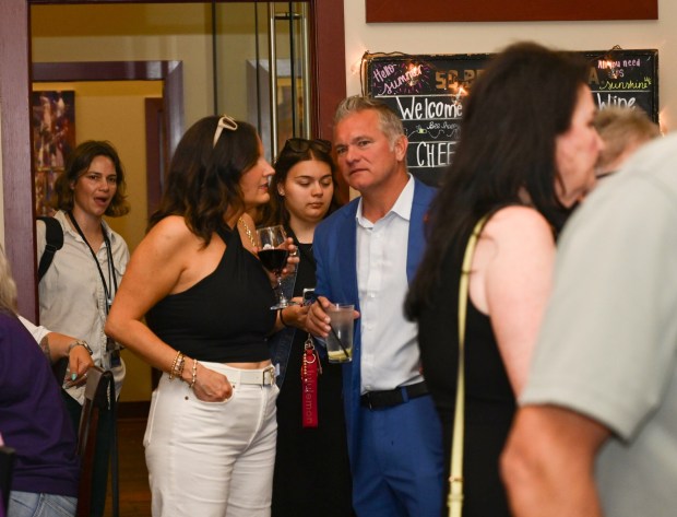 Supporters wait for former Bethlehem firefighter and Democratic congressional candidate Bob Brooks to arrive at his election party on Primary Day, Tuesday, May 19, 2026, at Artisan in Bethlehem. (Monica Cabrera/The Morning Call)