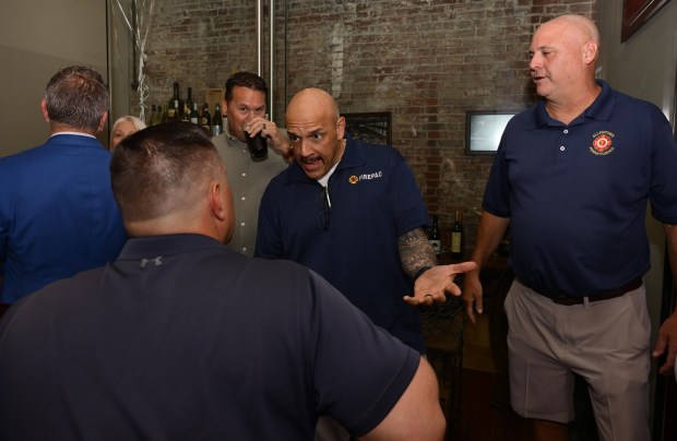 Supporters wait for former Bethlehem firefighter and Democratic congressional candidate Bob Brooks to arrive at his election party on Primary Day, Tuesday, May 19, 2026, at Artisan in Bethlehem. (Monica Cabrera/The Morning Call)