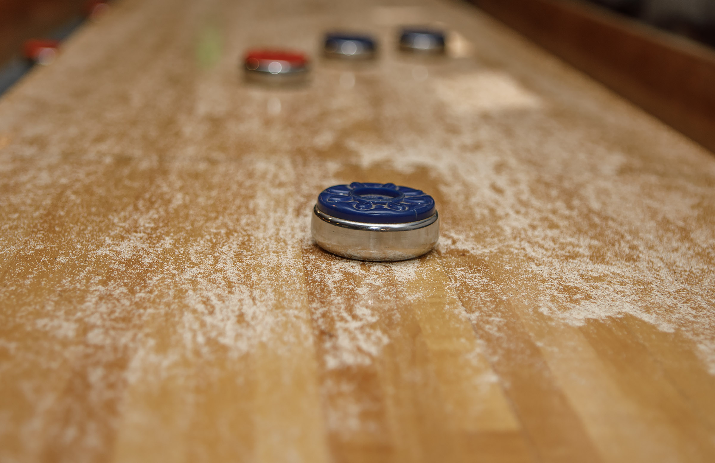 A vintage shuffle board table in the HiJinx Brewing Co....