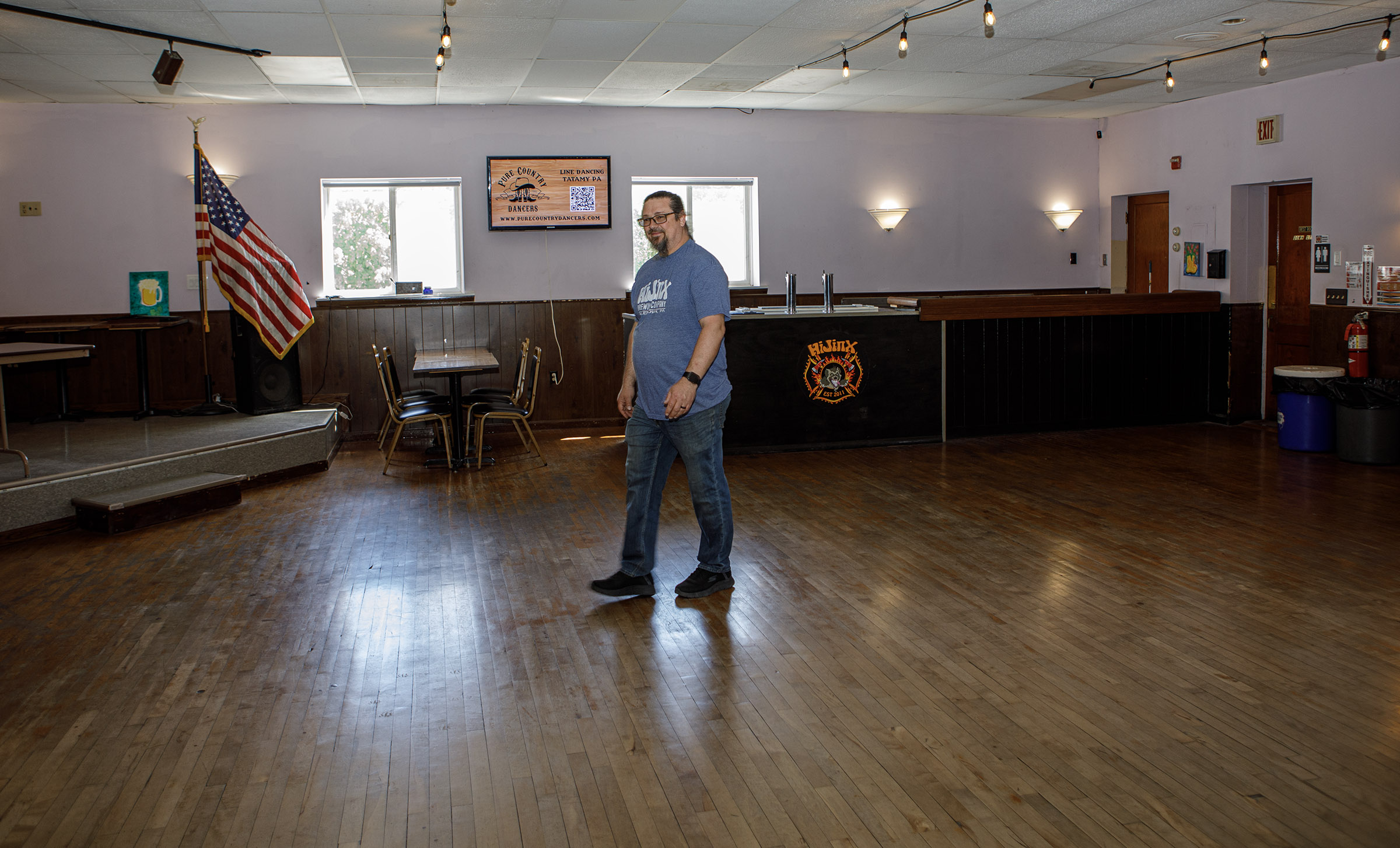 HiJinx Brewing Co. owner Curt Keck walks in the social...