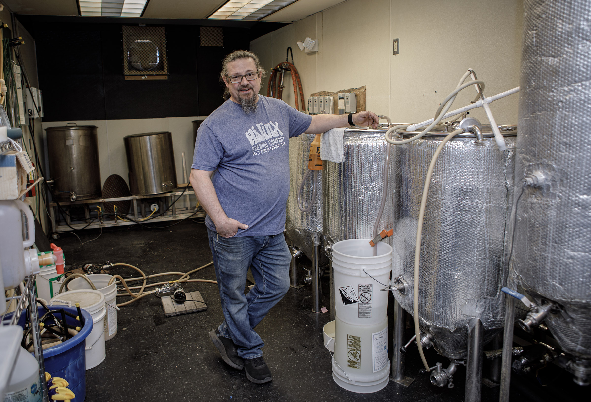 HiJinx Brewing Co. owner Curt Keck stands in the distillery...