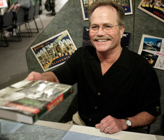 Actor Jon Provost, who played Timmy from the TV show "Lassie", signs copies of his book Sunday, Feb. 17, 2008, in Los Angeles. (Ric Francis/AP)