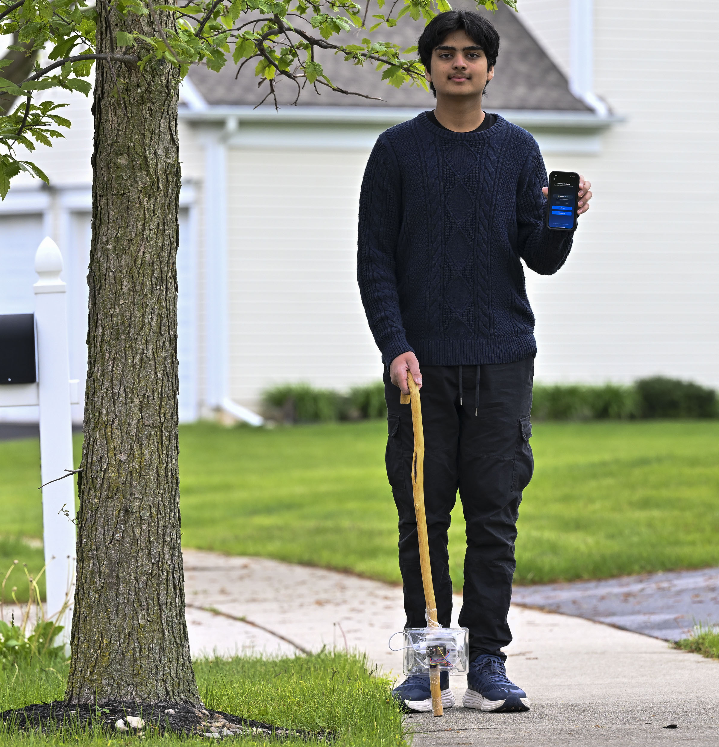 Devansh Garg, a Parkland High School freshman, demonstrates the SafeStep...