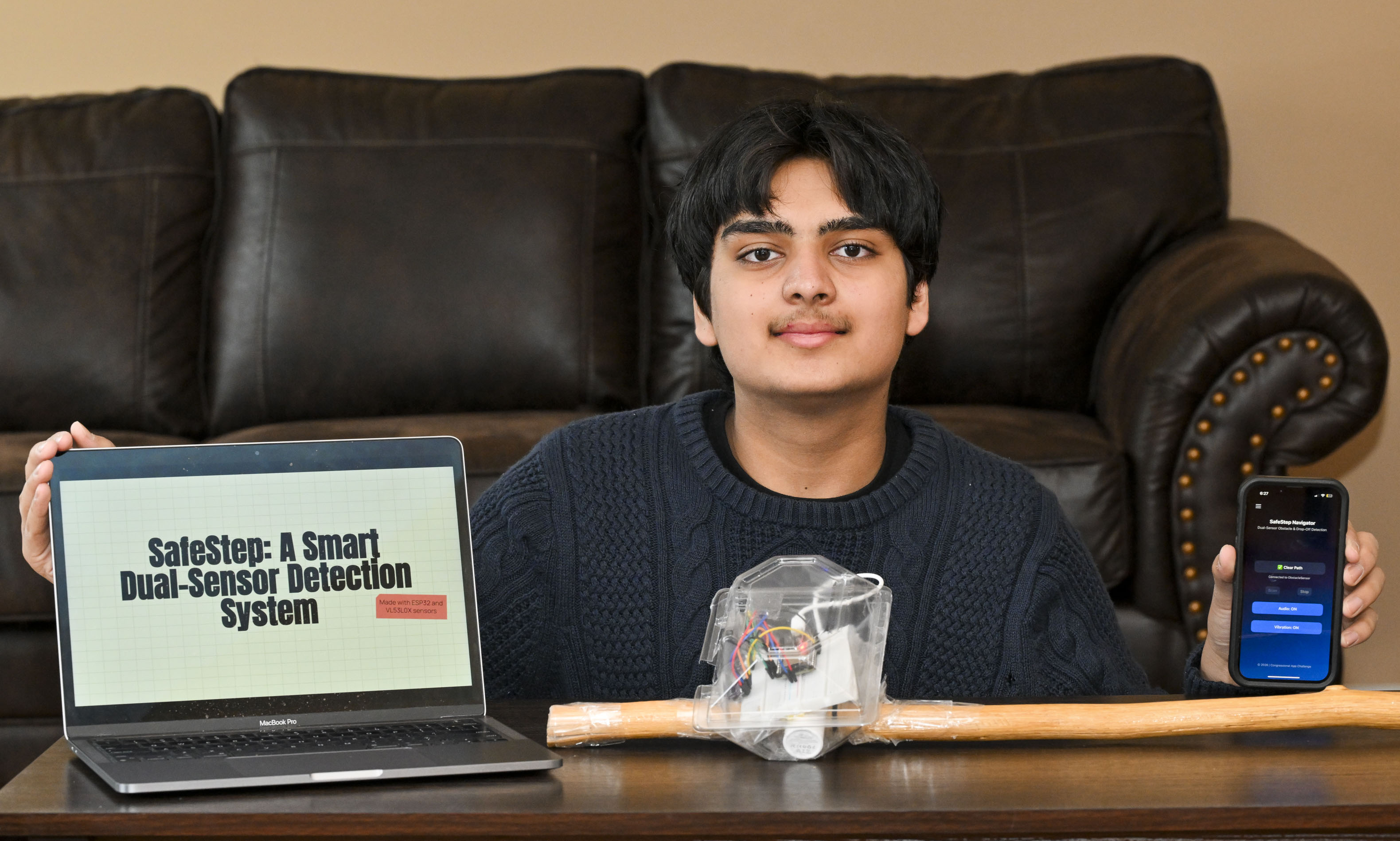 Devansh Garg, a Parkland High School freshman, demonstrates the SafeStep...