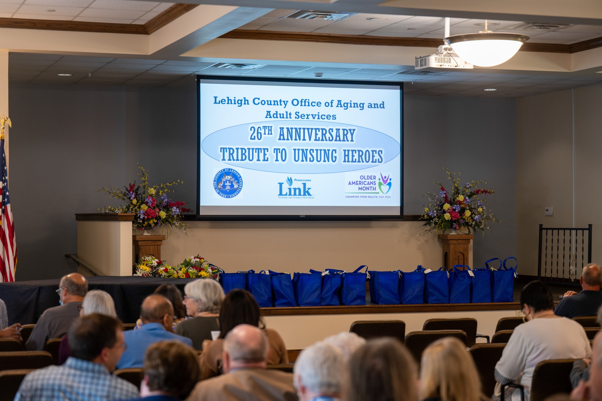 A packed house watches the ceremony during Lehigh County Aging & Adult Services' 26th annual Unsung Heroes tribute Wednesday, May 13, 2026, at Fellowship Community's Zentz Center in Whitehall Township. The annual tribute recognizes older adults who have enhanced their communities through active engagement, volunteerism and service to others. (Jonathan Broady/Special to The Morning Call)