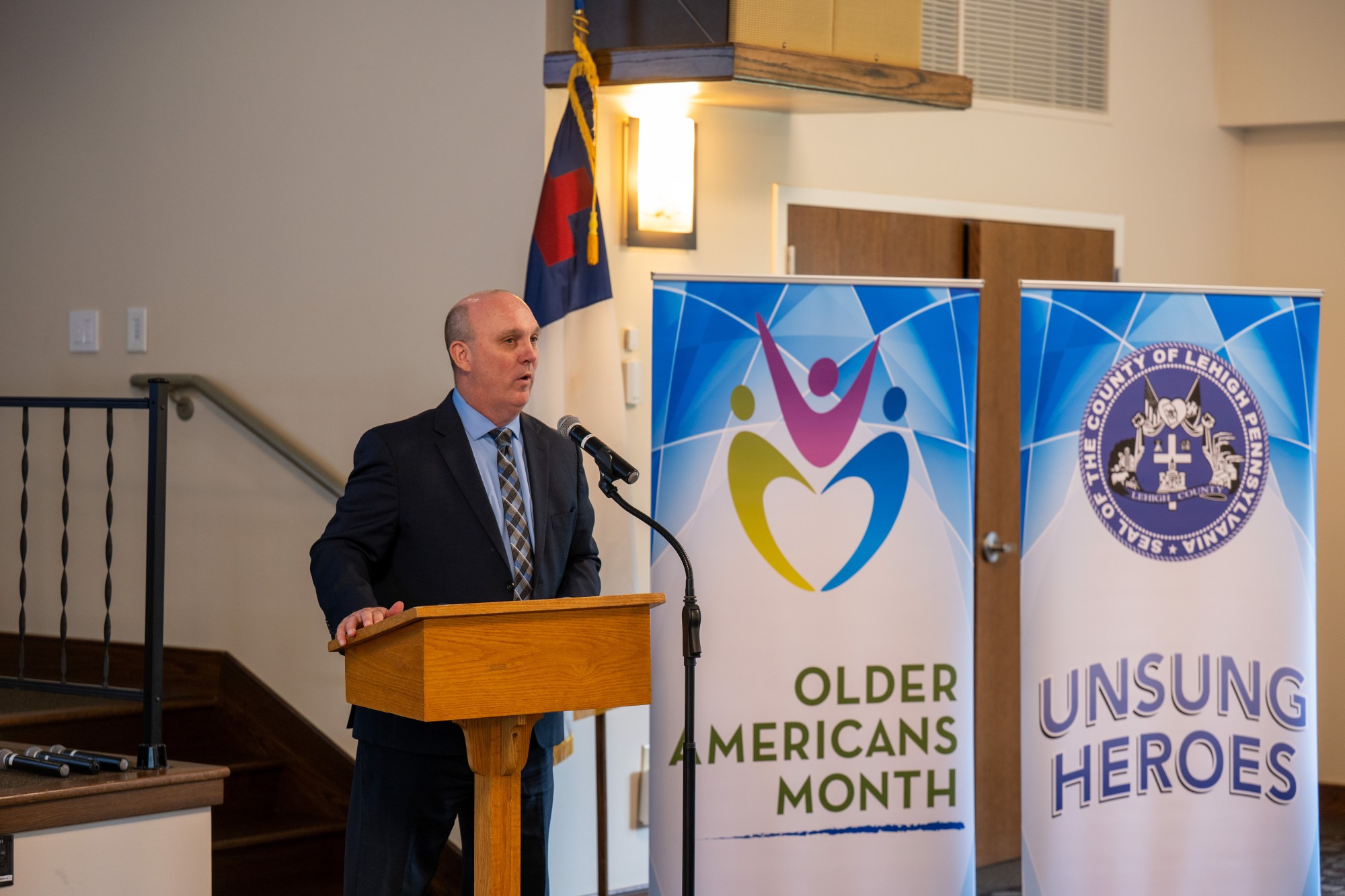 Lehigh County Office Of the aging and Adult Services JR Reed speaks during Lehigh County Aging & Adult Services' 26th annual Unsung Heroes tribute Wednesday, May 13, 2026, at Fellowship Community's Zentz Center in Whitehall Township. The annual tribute recognizes older adults who have enhanced their communities through active engagement, volunteerism and service to others. (Jonathan Broady/Special to The Morning Call)