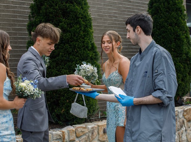 Wilson Area High School students and their guests arrive for prom Friday, May 15, at The Club at Twin Lakes in North Whitehall Township. (Jane Therese/Special to The Morning Call)