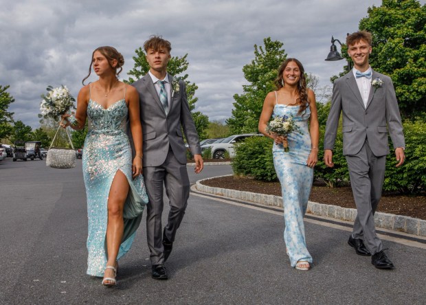 Wilson Area High School students and their guests arrive for prom Friday, May 15, at The Club at Twin Lakes in North Whitehall Township. (Jane Therese/Special to The Morning Call)