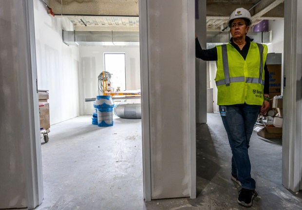 Kassie Hilgert, President and CEO, ArtsQuest stands in the doorway of an artist studio space on the media tour of its new Creative Factory on Thursday, May 14, 2026, in Bethlehem. The informal walking tour shows the latest construction progress ahead of the building's anticipated soft opening later this year and highlights key spaces throughout the facility, including hospitality and event areas, classrooms, artist studios, gallery spaces, glass studio with observation space, performing art theater and more. (April Gamiz/The Morning Call)