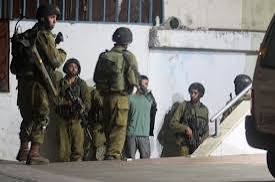 Israeli enemy forces attack Palestinians south of Bethlehem, arrest young man, activist in al-Quds