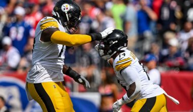 Sep 21, 2025; Foxborough, Massachusetts, USA; Pittsburgh Steelers running back Kenneth Gainwell (14) and Pittsburgh Steelers offensive tackle Broderick Jones (77) react after a touchdown during the first quarter at Gillette Stadium.