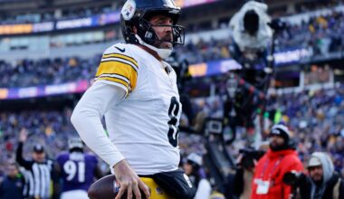 Dec 7, 2025; Baltimore, Maryland, USA; Pittsburgh Steelers quarterback Aaron Rodgers (8) reacts after scoring a touchdown against the Baltimore Ravens during the first half at M&T Bank Stadium.