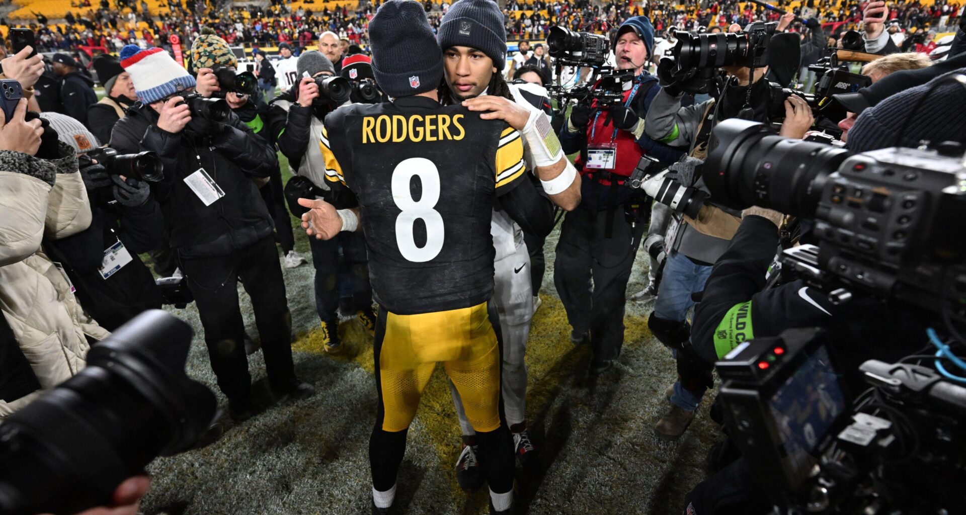 Jan 12, 2026; Pittsburgh, PA, USA; Houston Texans quarterback C.J. Stroud (7) greets Pittsburgh Steelers quarterback Aaron Rodgers following their AFC Wild Card Round game at Acrisure Stadium.