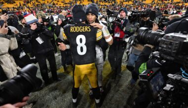 Jan 12, 2026; Pittsburgh, PA, USA; Houston Texans quarterback C.J. Stroud (7) greets Pittsburgh Steelers quarterback Aaron Rodgers following their AFC Wild Card Round game at Acrisure Stadium.