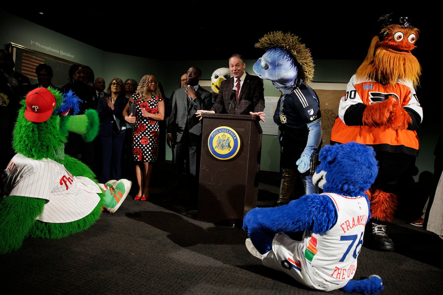 R. Scott Stephenson, president and CEO of the Museum of the American Revolution, spoke while surrounded by Philly mascots before the City Council Committee on Legislative Oversight hearing in April.