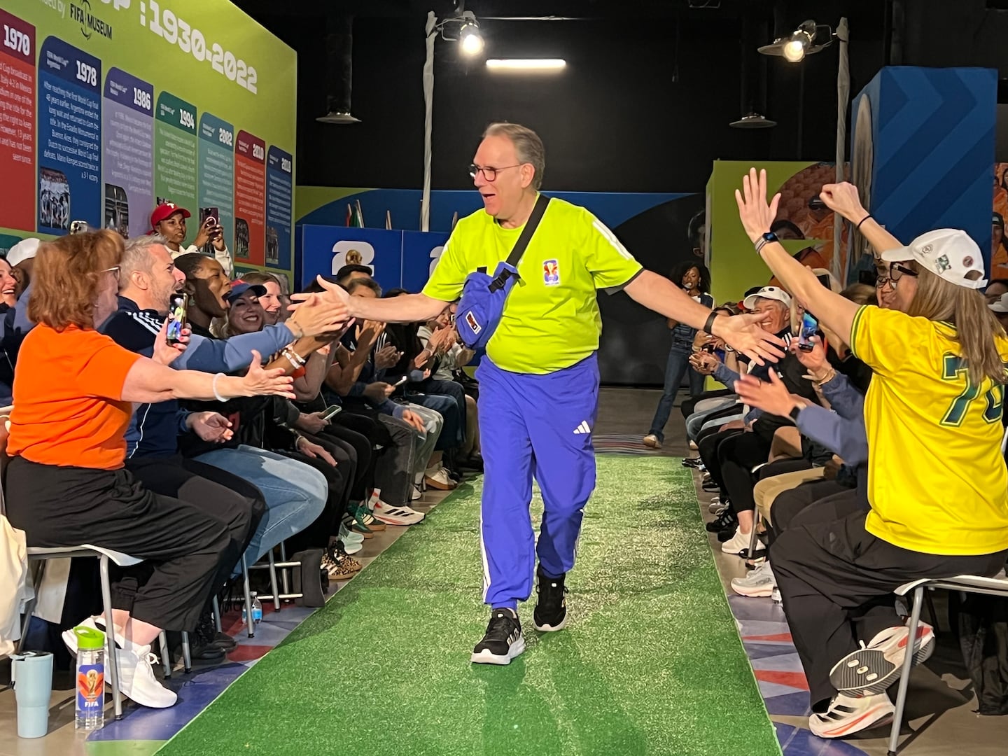 Soccer fans gathered in Philadelphia's Fashion District last month to cheer on volunteers, who showed off the uniforms they will wear during the World Cup.