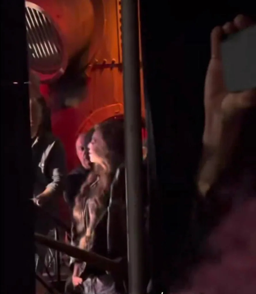 At one point, she was spotted headbanging along to the song. TheRocSupremacy/X