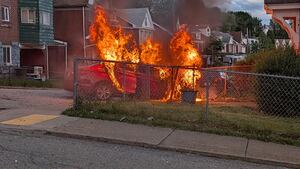 Car crashes into fence, catches fire in Pittsburgh neighborhood
