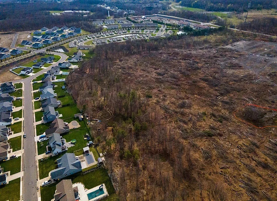 An aerial view of Project Boson in Archbald, PA, is pictured in close proximity to The Highland's neighborhood as well as Valley View High School (top left). Project Boson will replace an auto parts junkyard with a nearly 620,000-square-foot data center. Local residents have raised significant concerns regarding environmental hazards from constructing on a former junkyard. <span class="image-credit">(Heather Ainsworth for The Washington Post via Getty Images)</span>