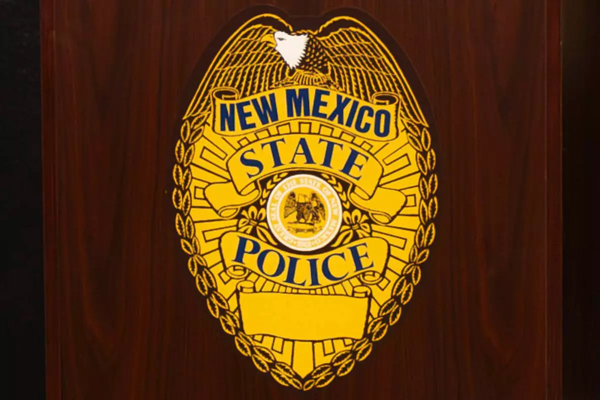 FILE - A New Mexico State Police emblem is displayed on podium during a news conference, March 16, 2024, in Albuquerque, N.M. (Jon Austria/The Albuquerque Journal via AP, File)