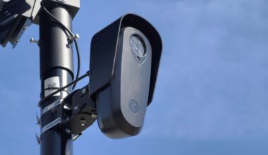 flock license plate reading camera mounted on a pole