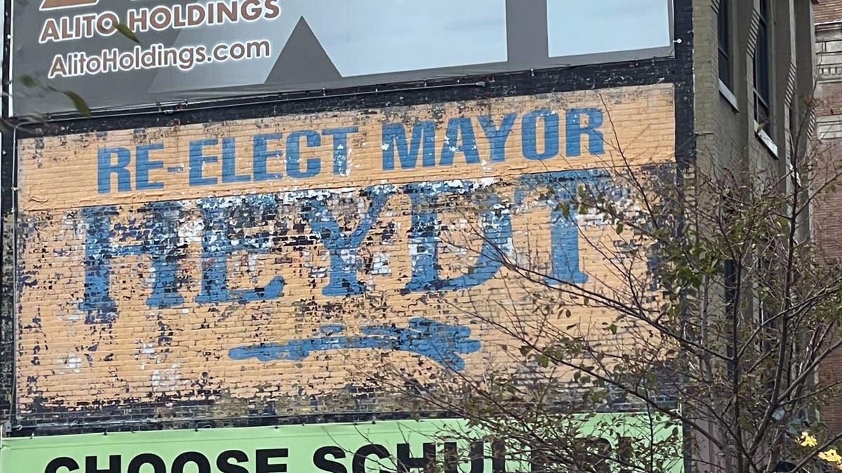 Bill Heydt's old-style campaign sign displayed on a wall on Eighth Street in Allentown